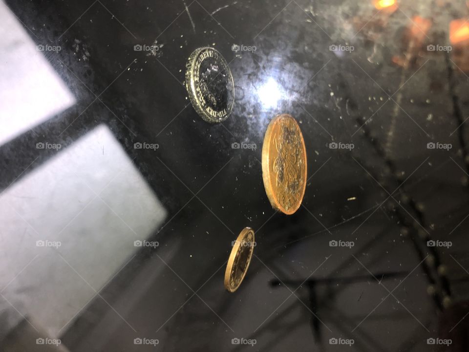 This is under the glass table where the pence stand still!power of the mind are unique and Powerful.