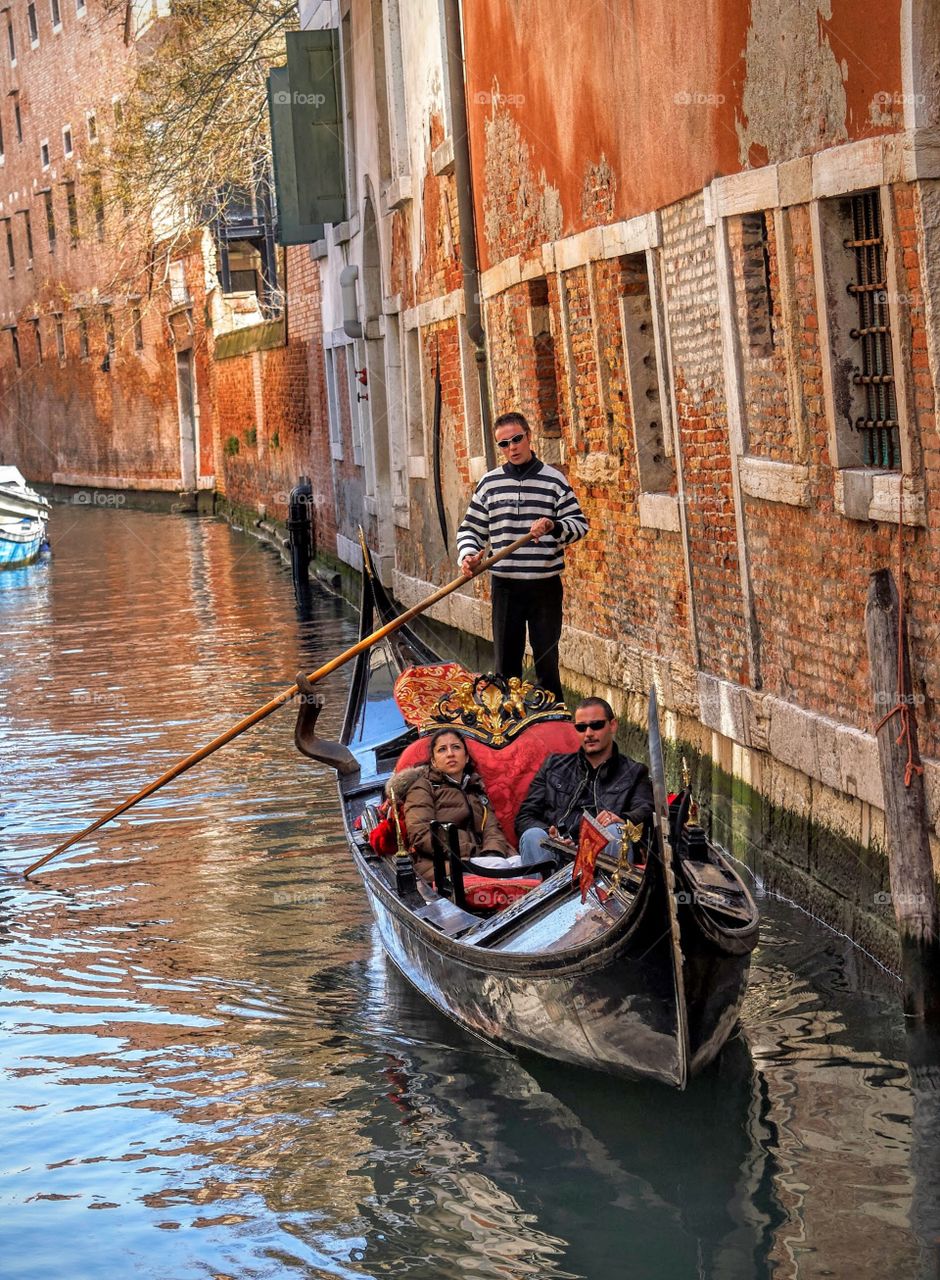 Gondola ride on a Venetian canal