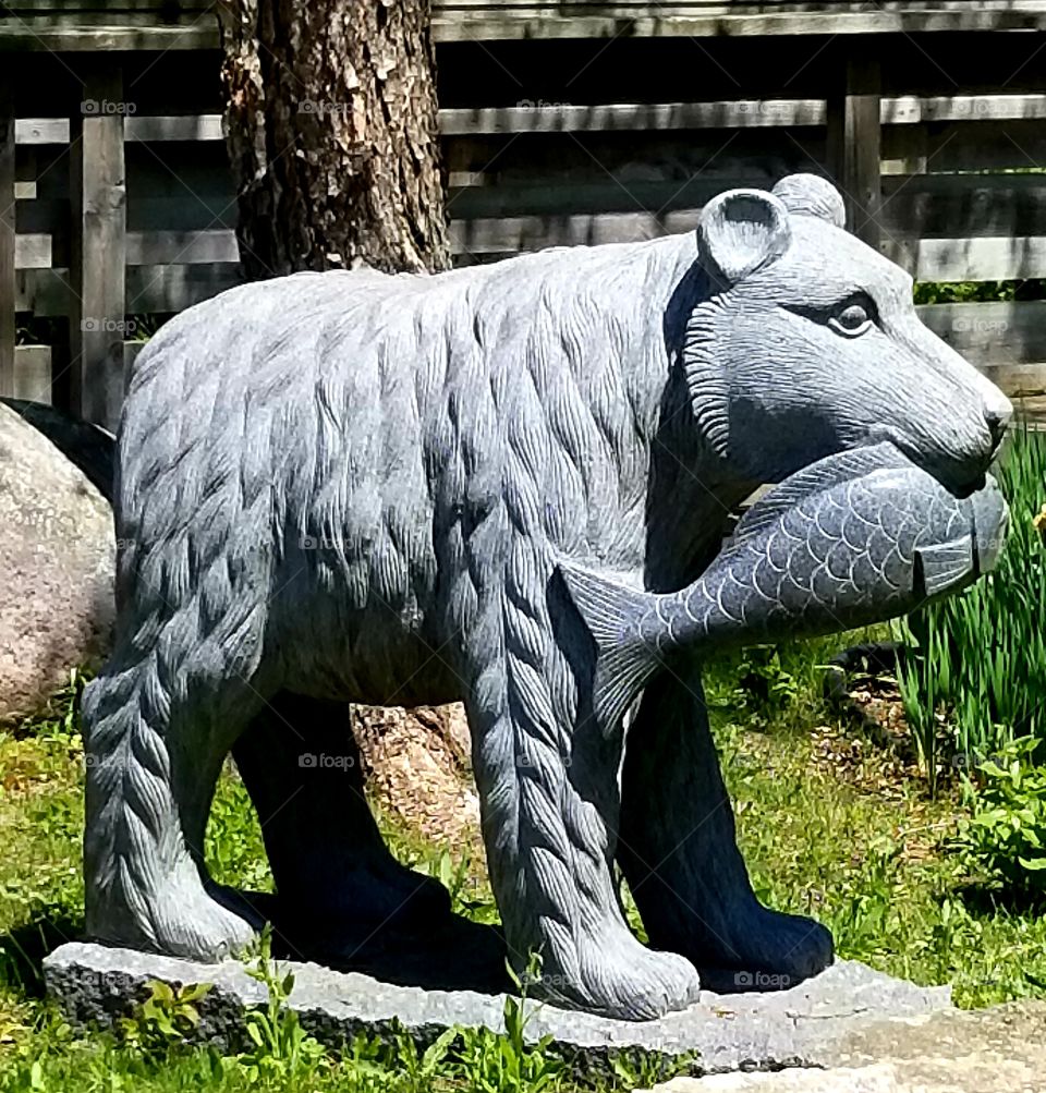 Stone Bear and Fish Sculpture
