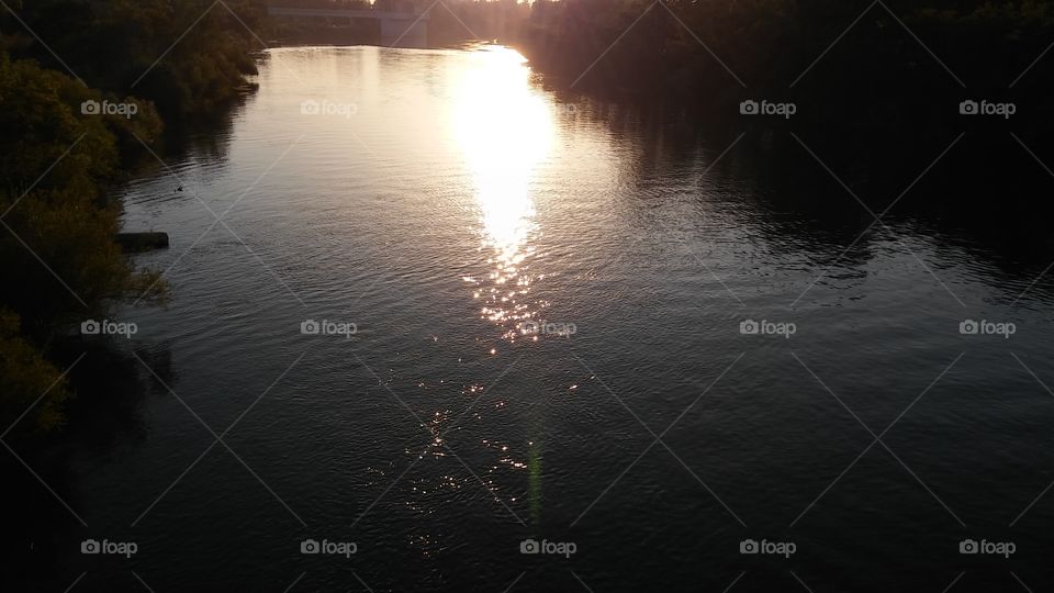 water reflecting a sunset