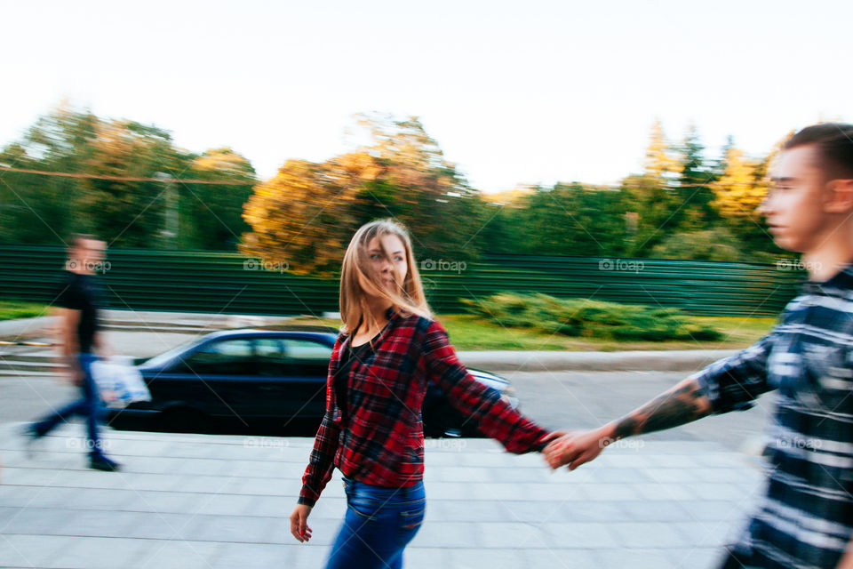 Girl hold hand of her lovely boy