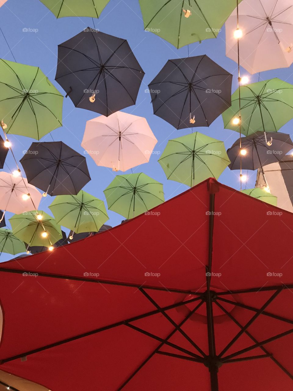 Colorful umbrellas on a blue sky provide a pop of color!