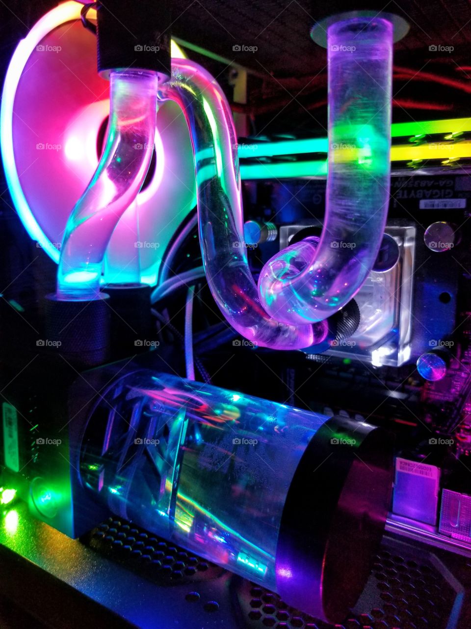 custom water cooling loop, inside a PC. RGB lighting.