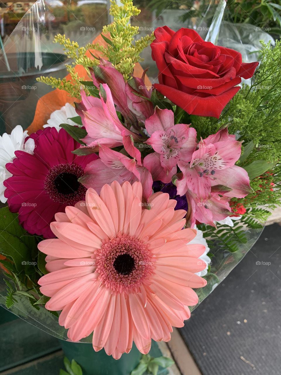 Variety of beautiful flowers in the flower shop with different colors of flower blossoms.