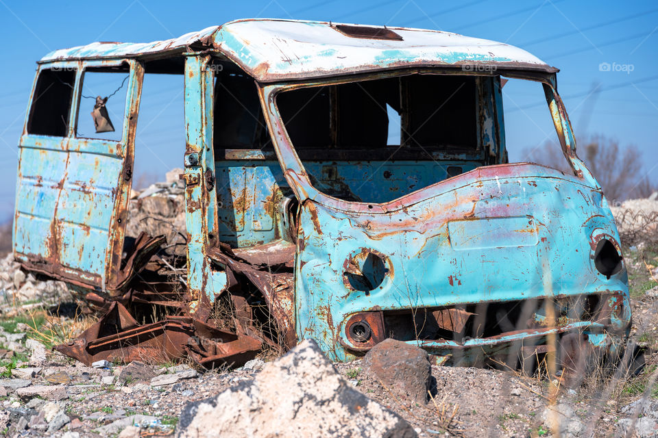 Rusty, old and abandoned Soviet Russian van out in the wasteland in rural Southern Armenia in Ararat province on 4 April 2017.