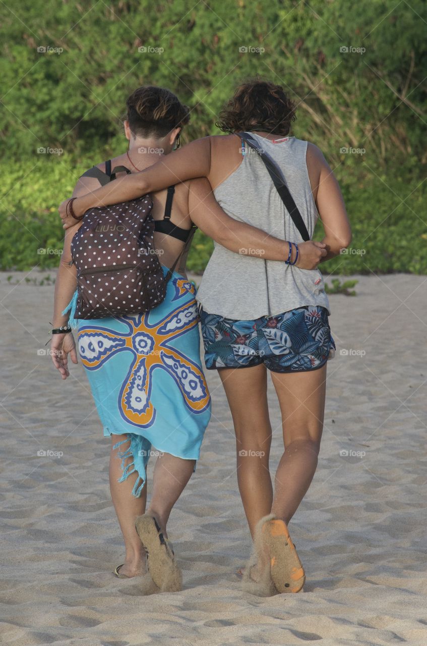 Woman hugging to sustain on walking 