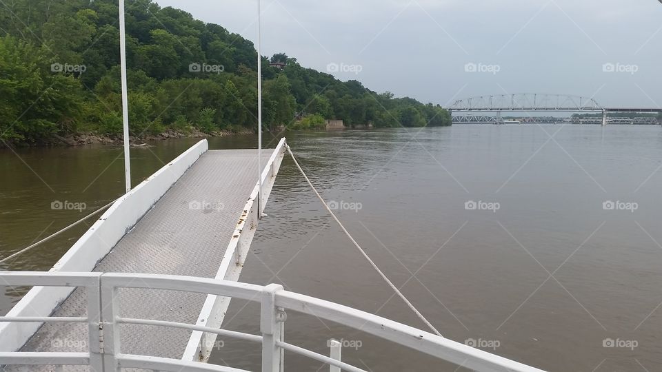 View of Mississippi River and bridge on a riverboat