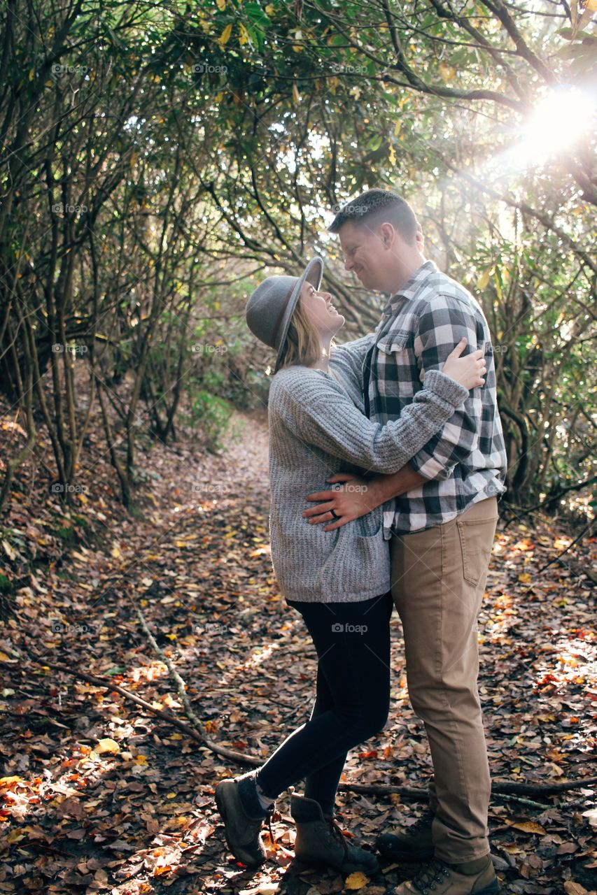 Lovers in nature’s golden glow 