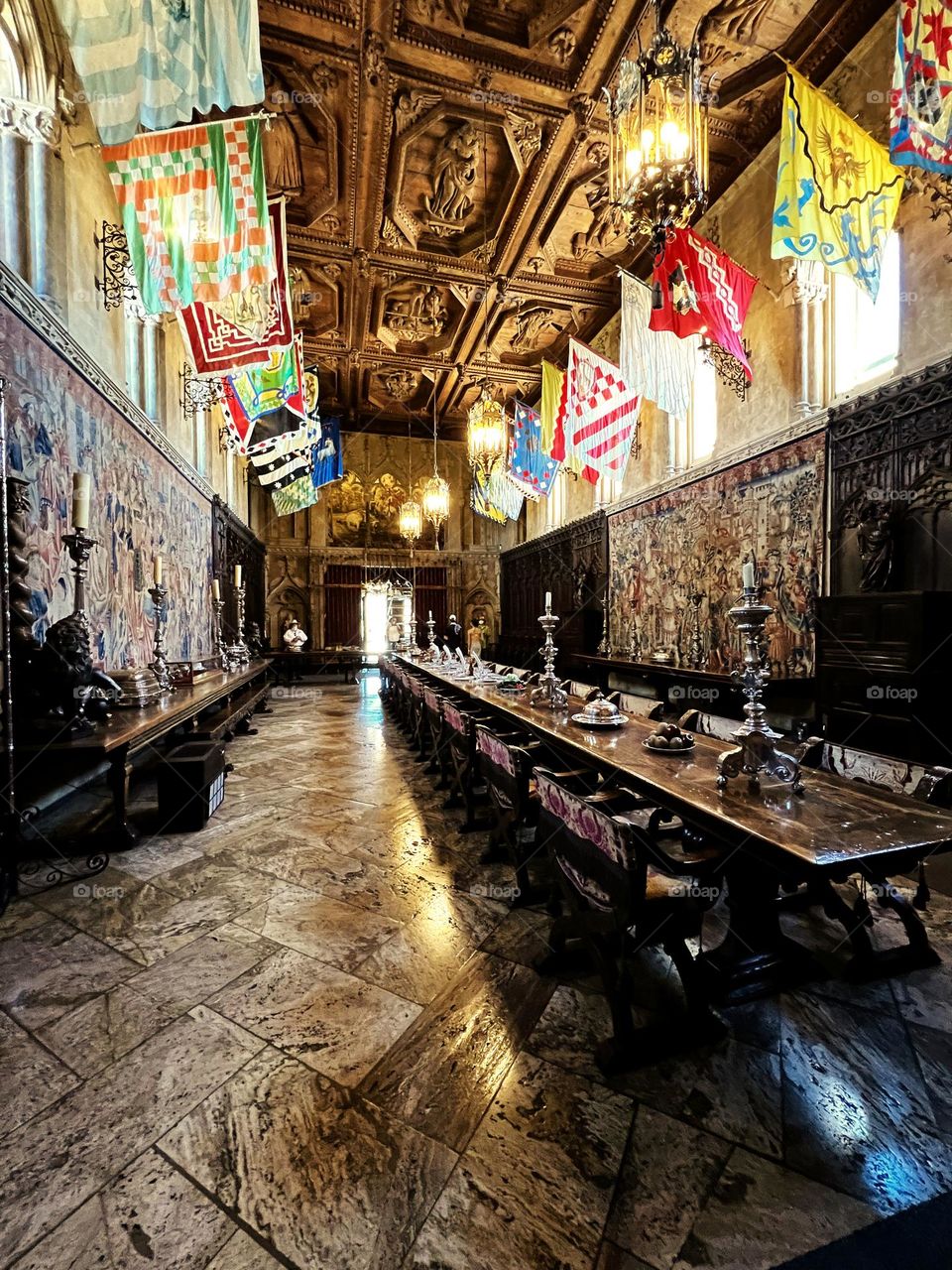 The dining room of Hearst Castle. The table and chairs are from a European monastery. A continuation of the medieval theme. The wooden ceiling was also imported. 