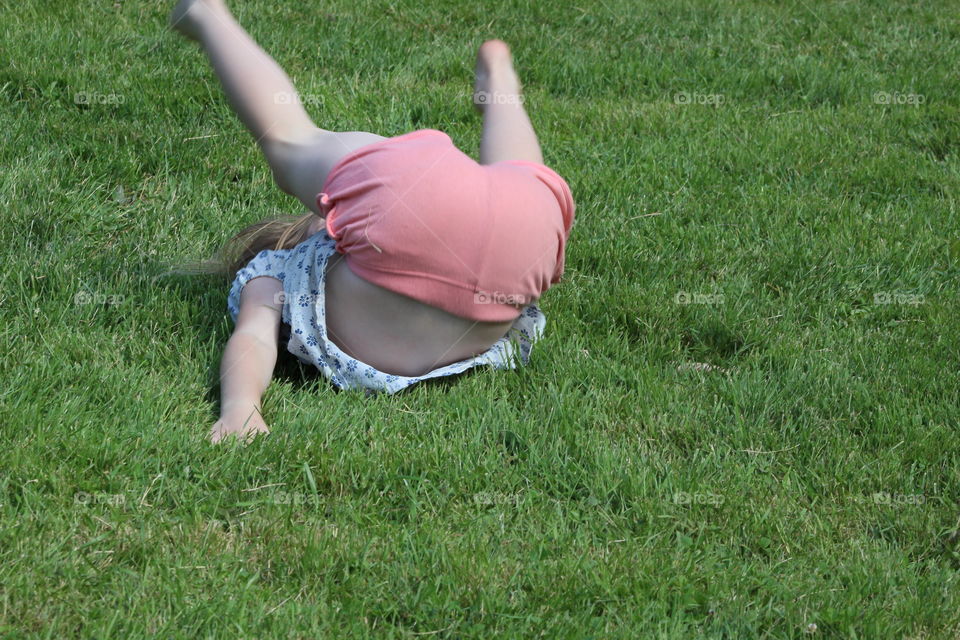 Child having fun in the summer. Pink!