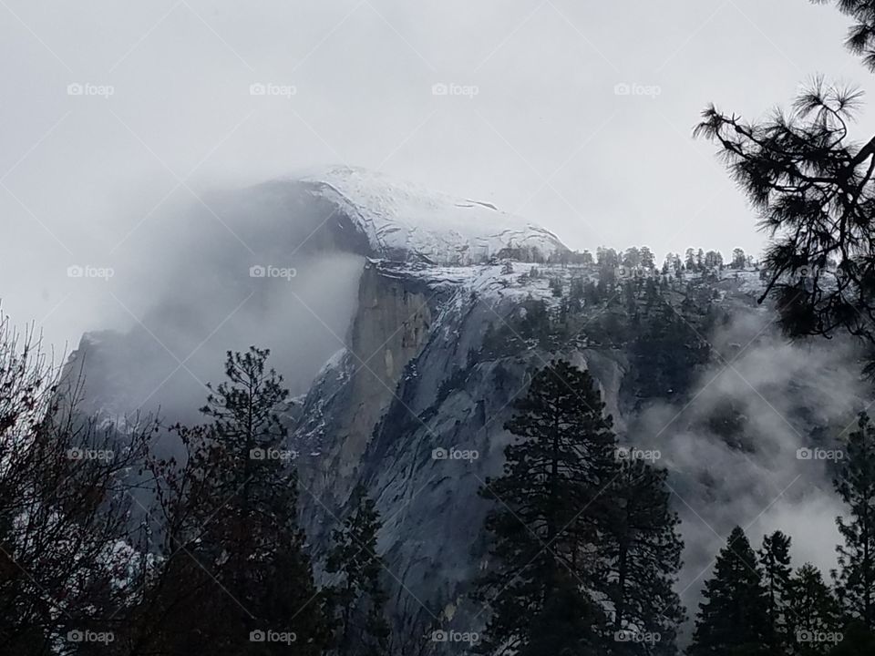 Half Dome in the clouds 3
