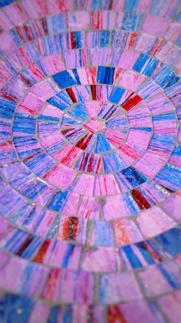 a colorful glass plate