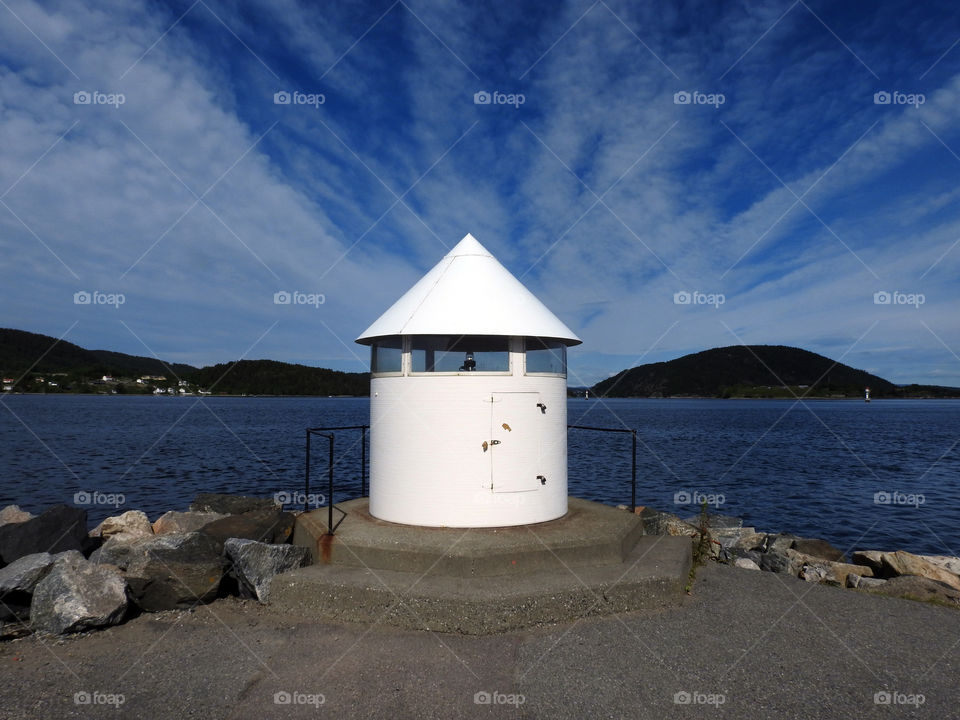 View of lighthouse at coastline