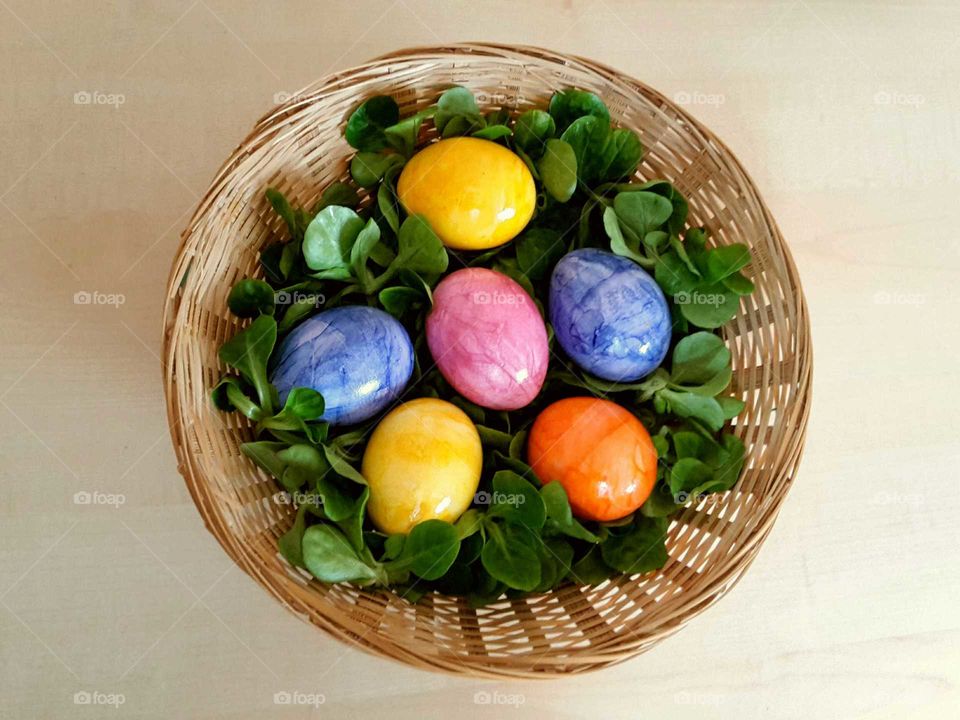 colorful Easter eggs in a basket