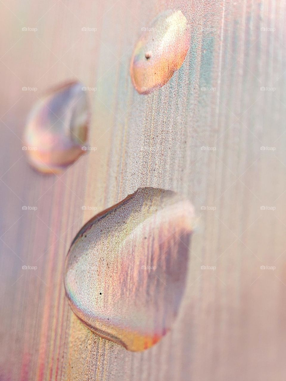 Droplets on a colourful background