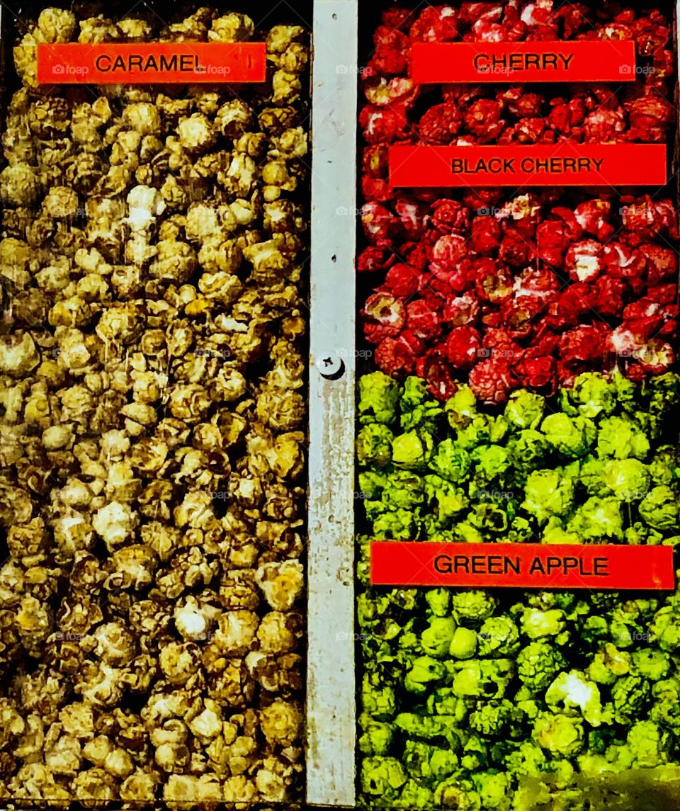Vibrant sweet popcorn. Caramel. Black cherry. Green apple. Colorful. Candy. Bright. High contrast. 