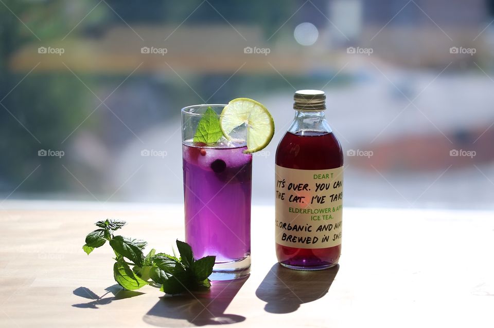 Summer juice with taste of elderberry juice, strawberries and butterfly pea flower tea 