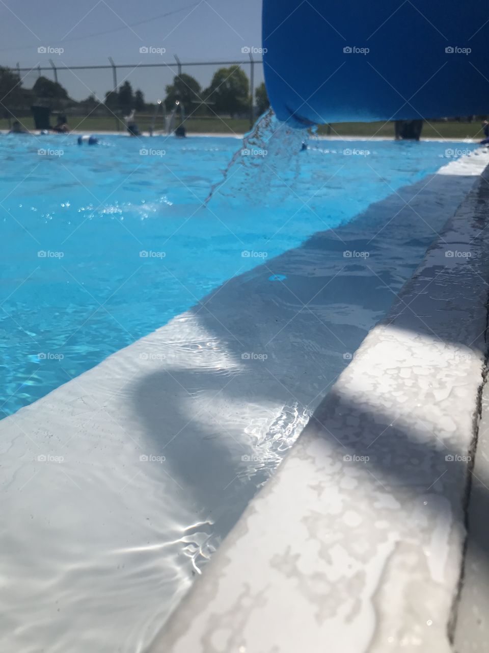 Water falling into pool 