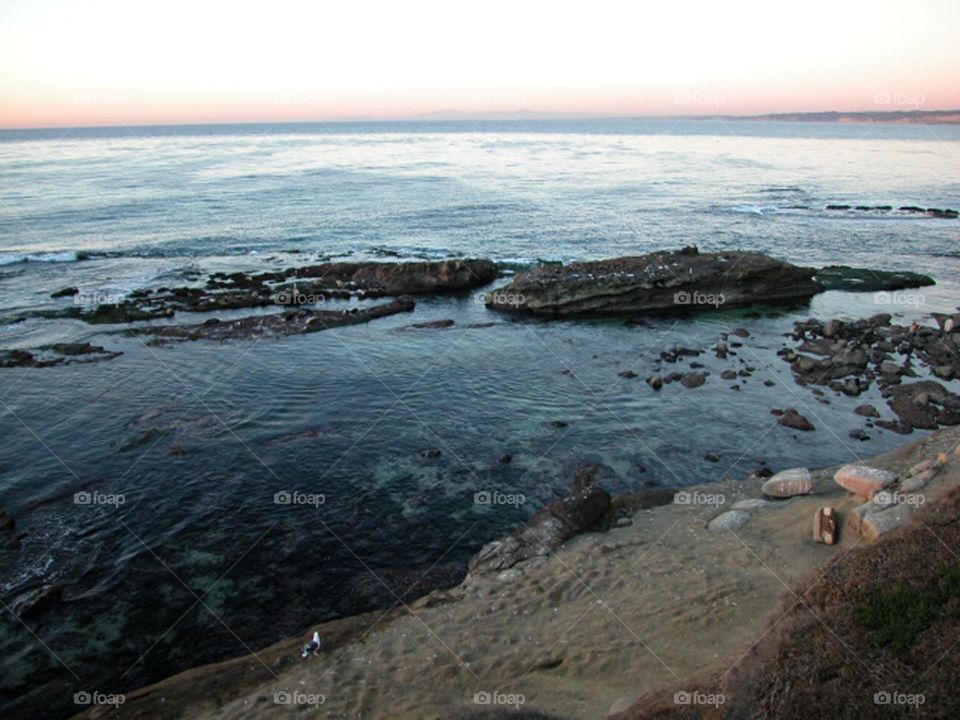 Beach area with a rock segment