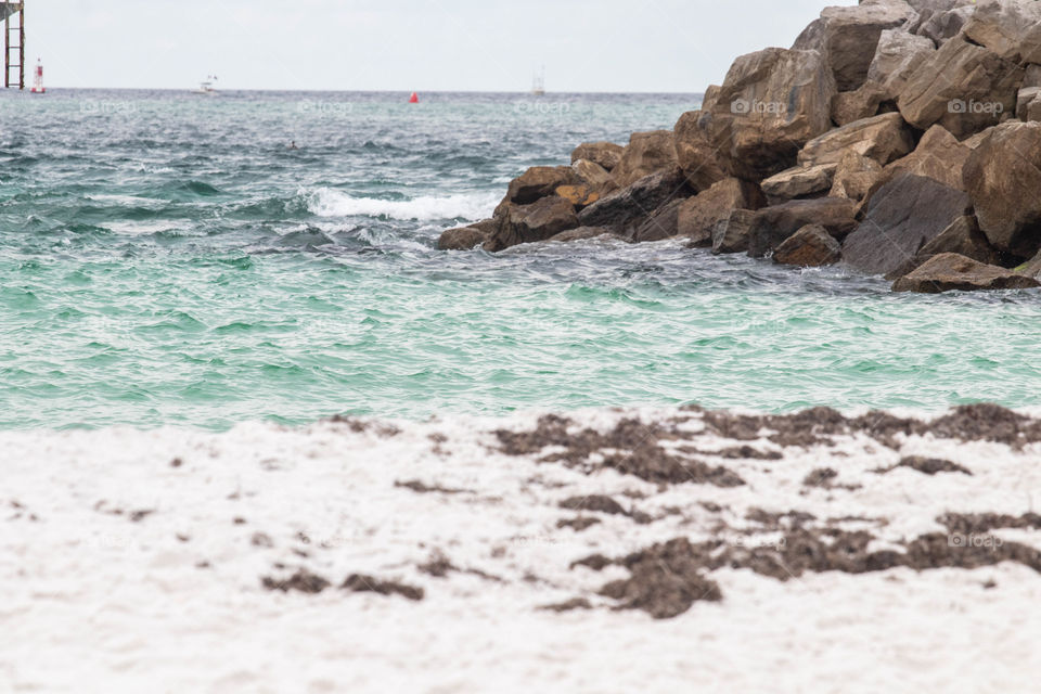 Waves crashing against the rocks