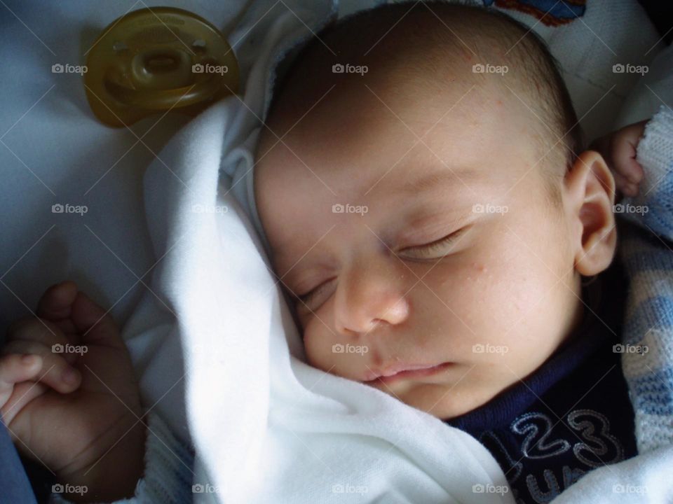 Newborn baby boy sleeping