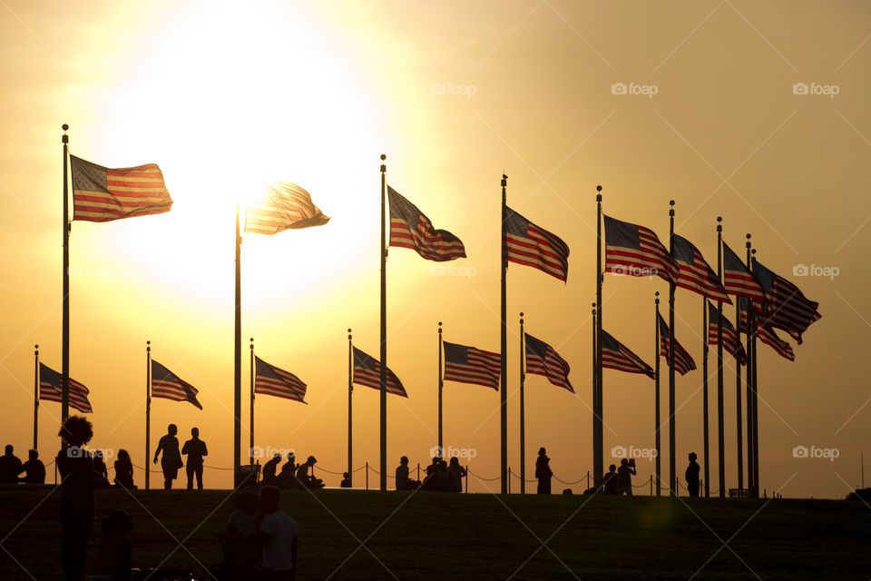 flags silhouette, sunset, people