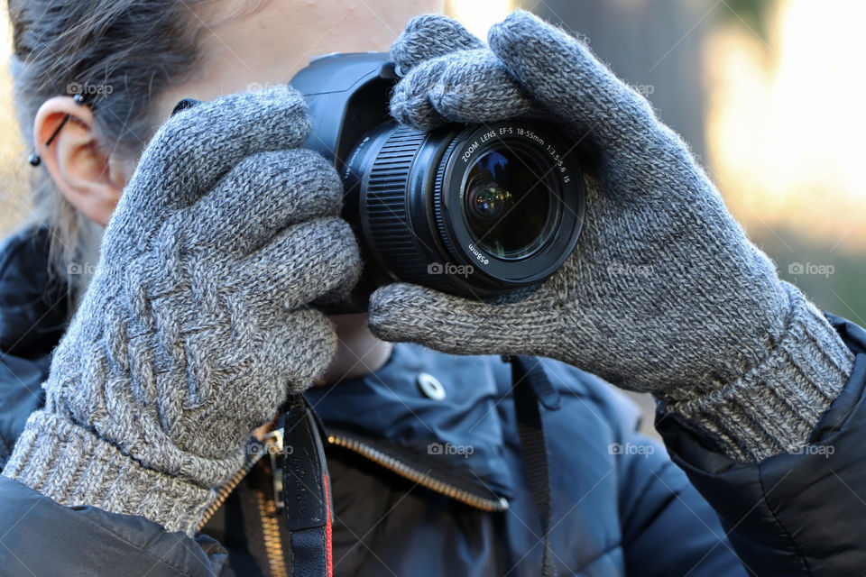 Young woman taking pictures