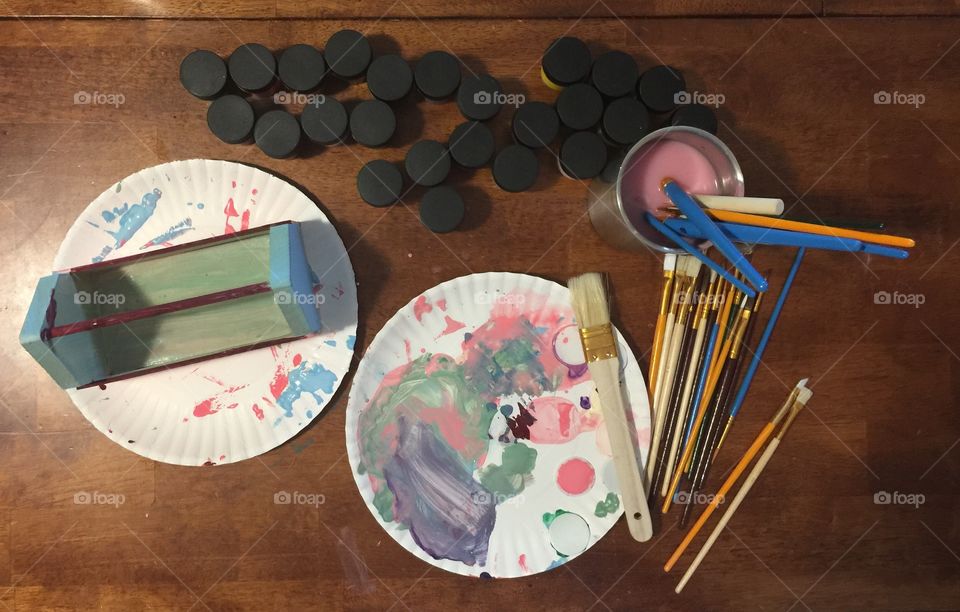Paints and brushes of a child