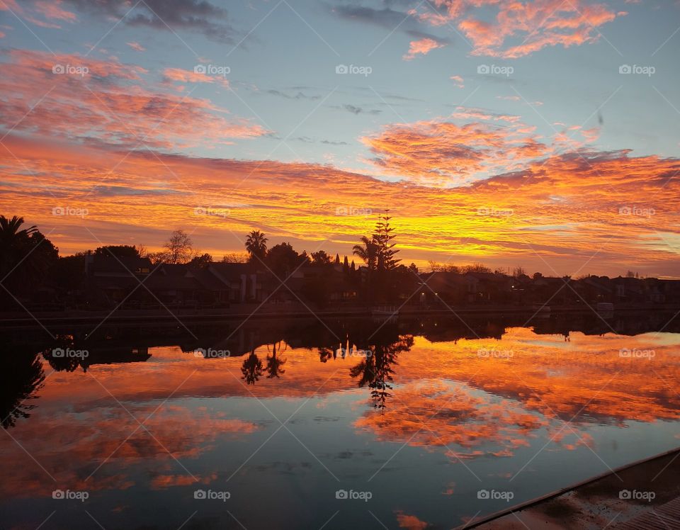 beautiful reflection sunrise on water