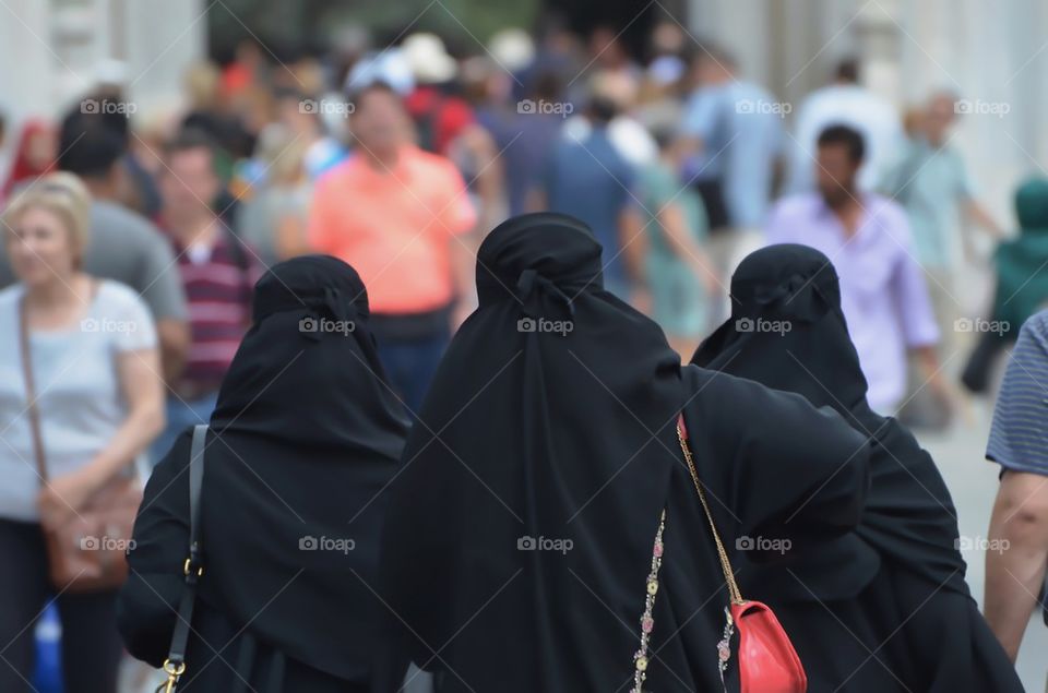 Muslim womens walking on a street of Istanbul, Turkey