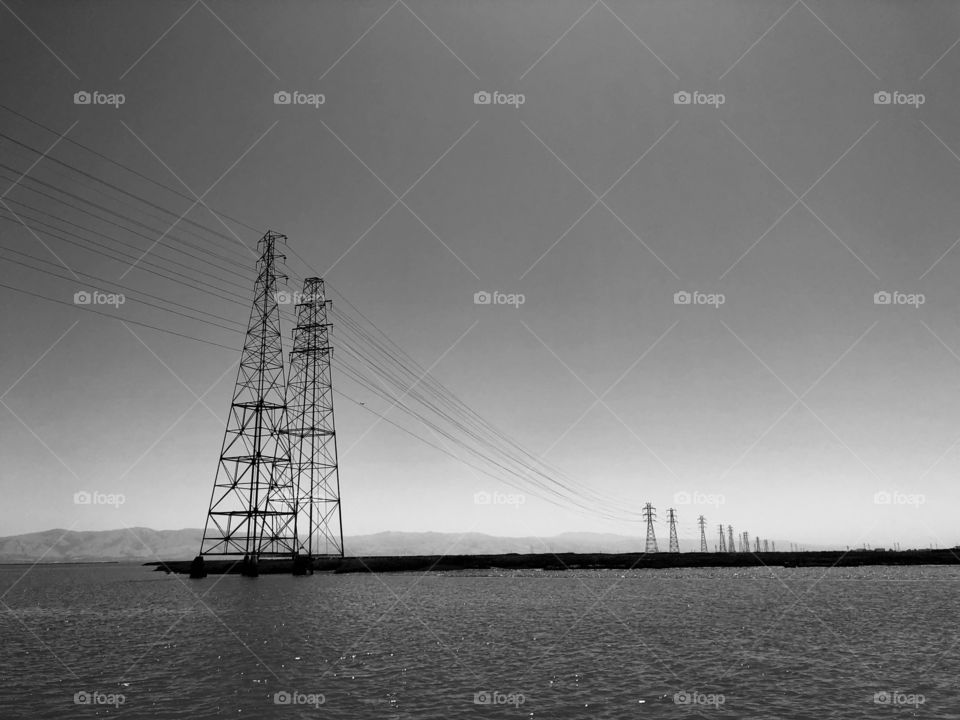 Electric towers in ocean
