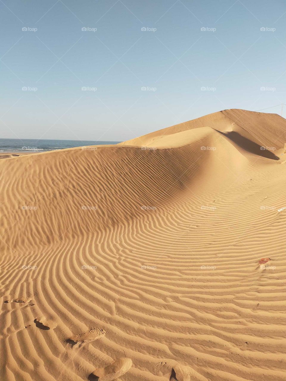 sand-dunes in the white beach in the region of Goulimine ,Morocco
