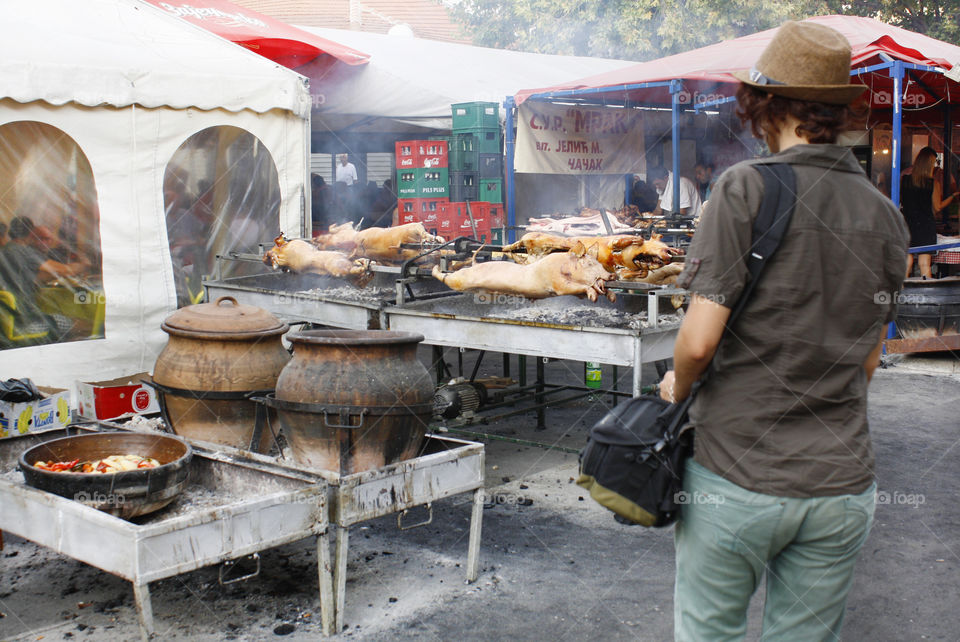 Street food, roasted piggs, tourist