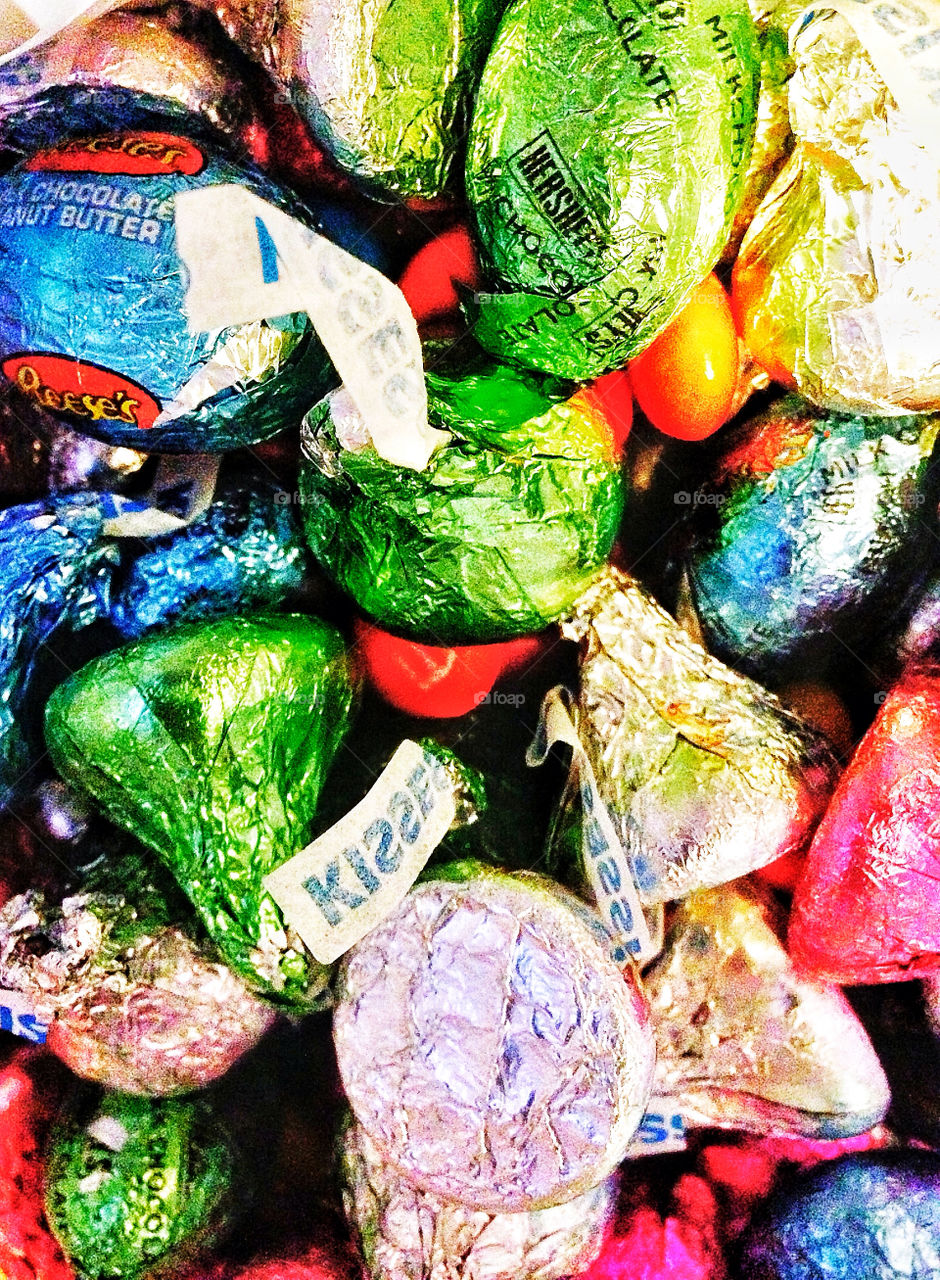 Assortment of candy Easter eggs and chocolate kisses wrapped in