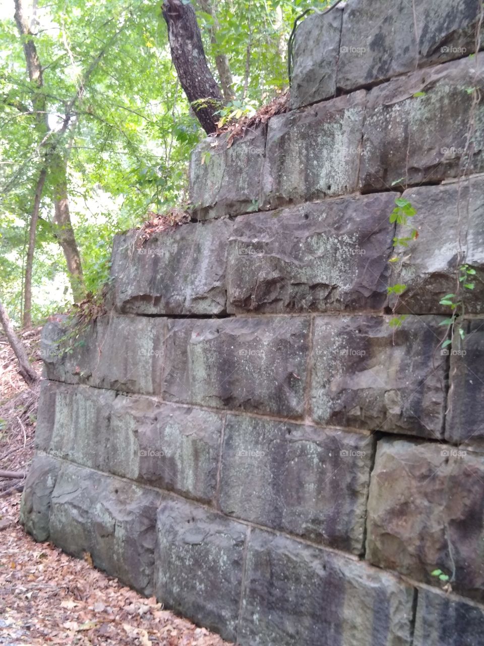 old railroad stone wall