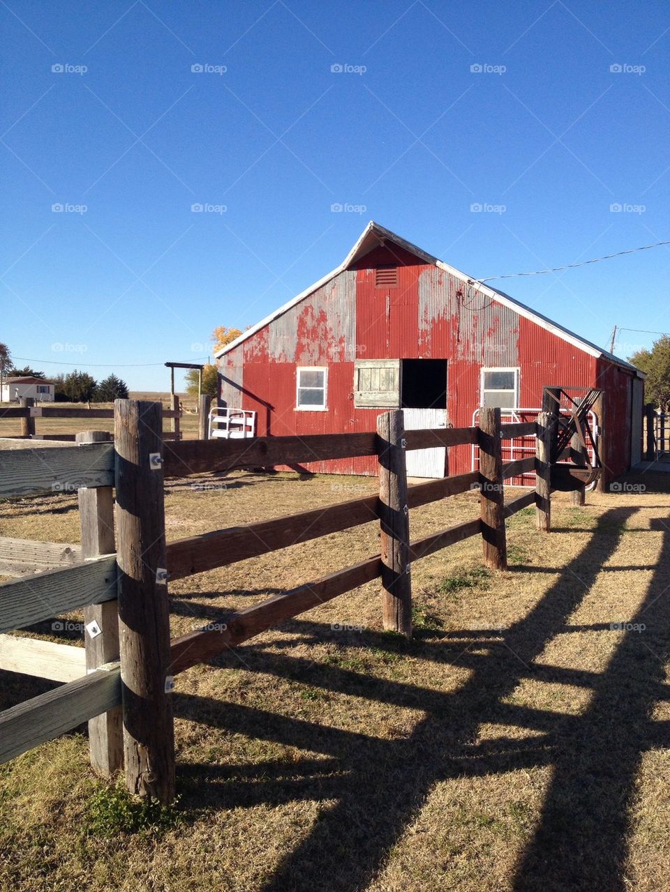 red fence barn farm by leanderthal