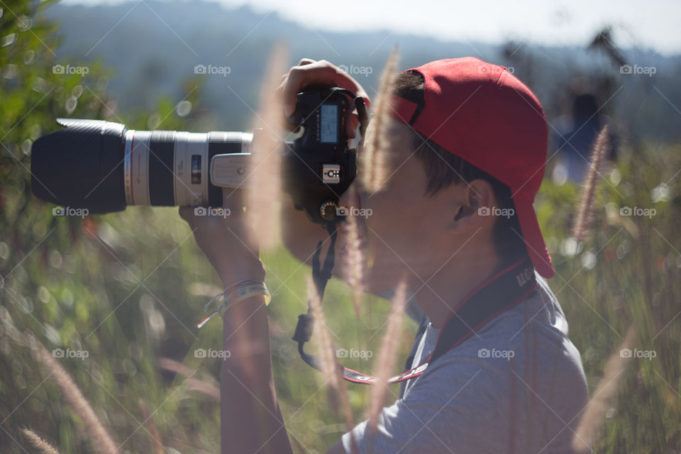 Male photographer in the field 