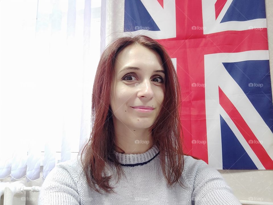 girl on the background of the British flag