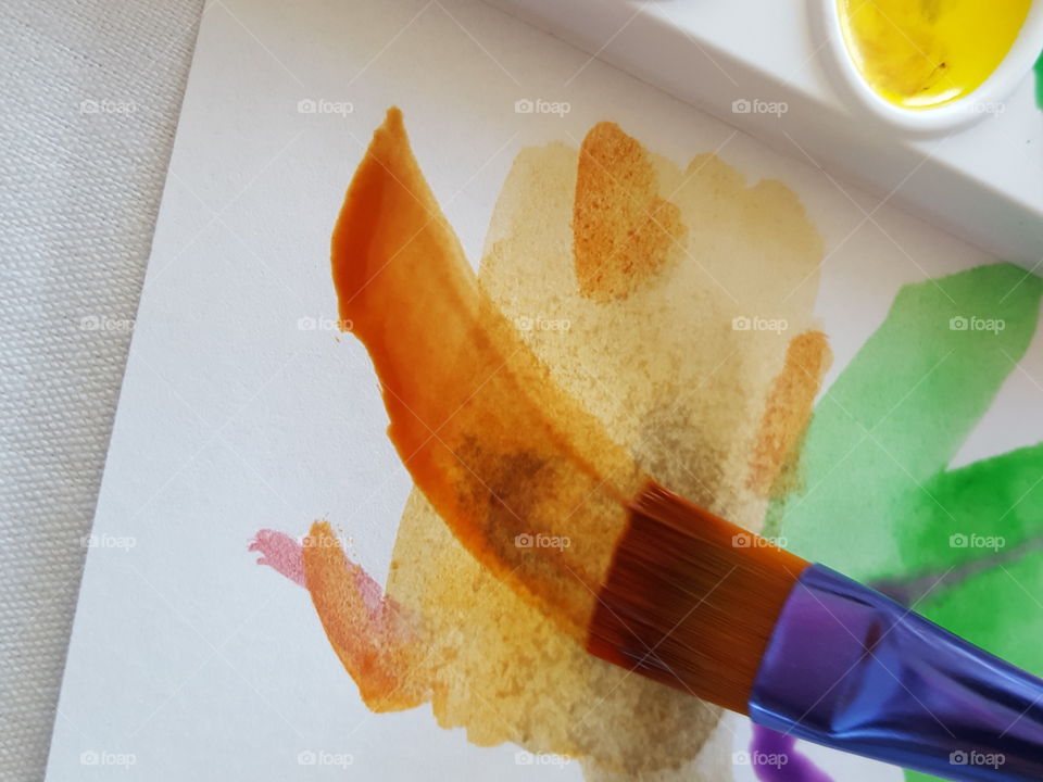 Close-up of painting with paintbrush