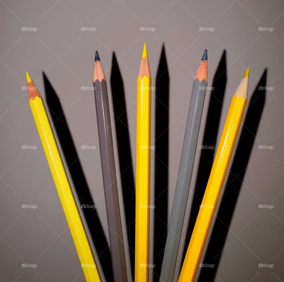 Yellow and grey pencils