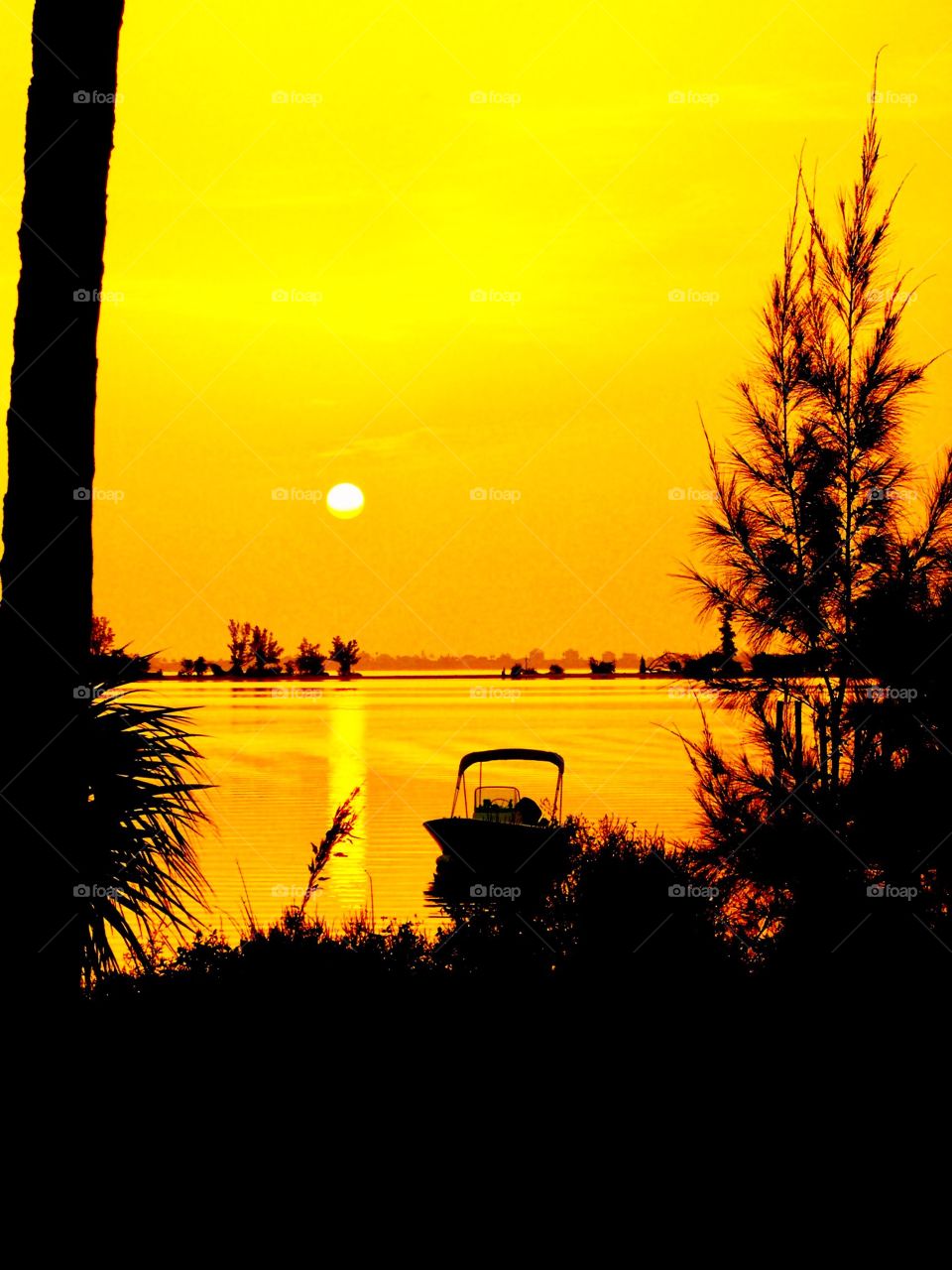 Boat on the water at sunset