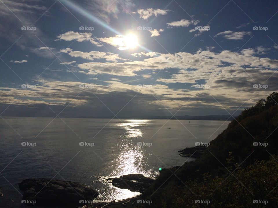 Sun illuminating the coastline 