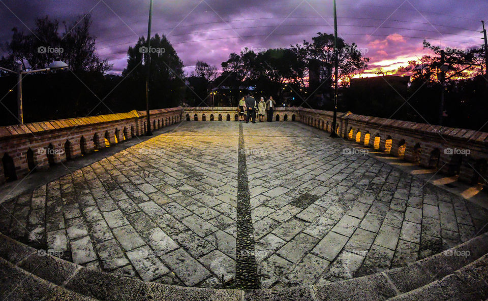 Wide angle of a bridge at sunset 