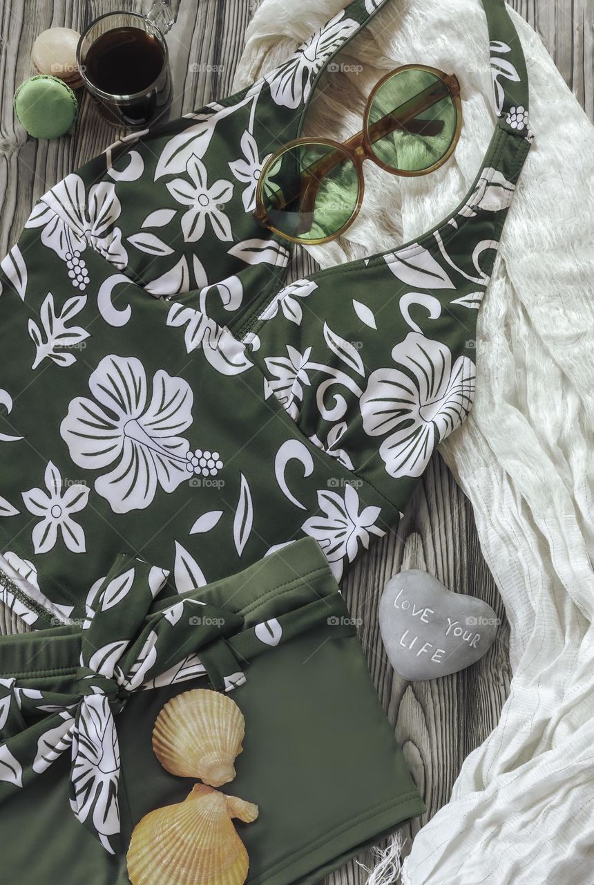 Hawaiian bikini flat lay giving vintage vibes 