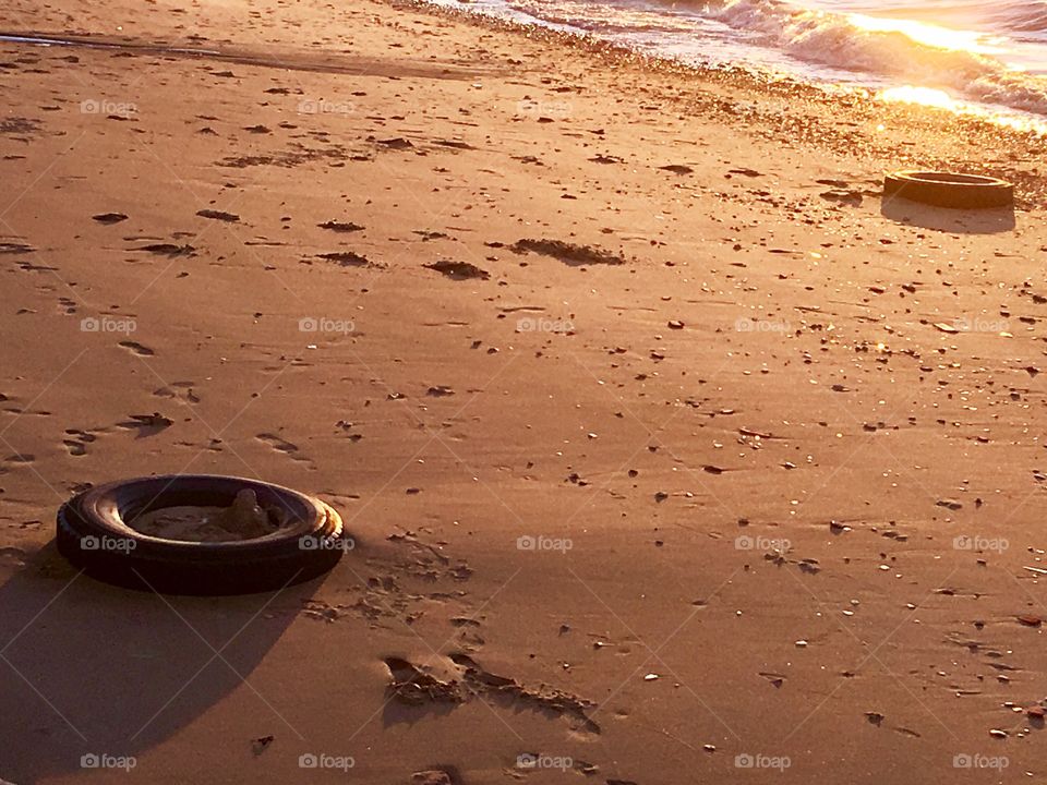 Tire in the beach