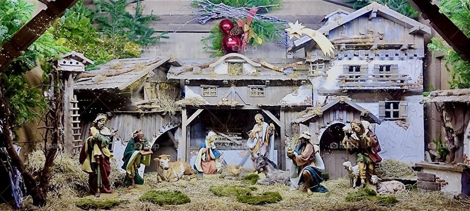 This is the “Nativity” at the “Christkindlmarkt”, a Christmas fair on the “Theresienplatz”, a main square with pedestrian zone in “Straubing”, “Lower Bavaria” commemorating the birth of our savior “Jesus Christ”. 2023. Hypnotic Productions