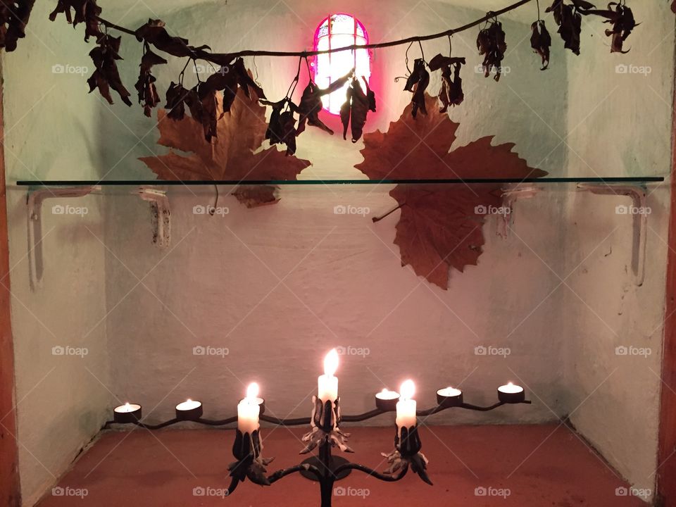 Wine cellar display and candles 