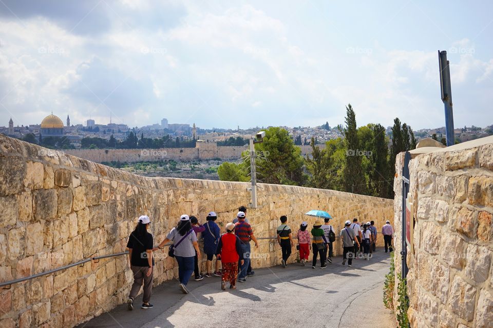 group of tourists, walk to Jerusalem of Israel