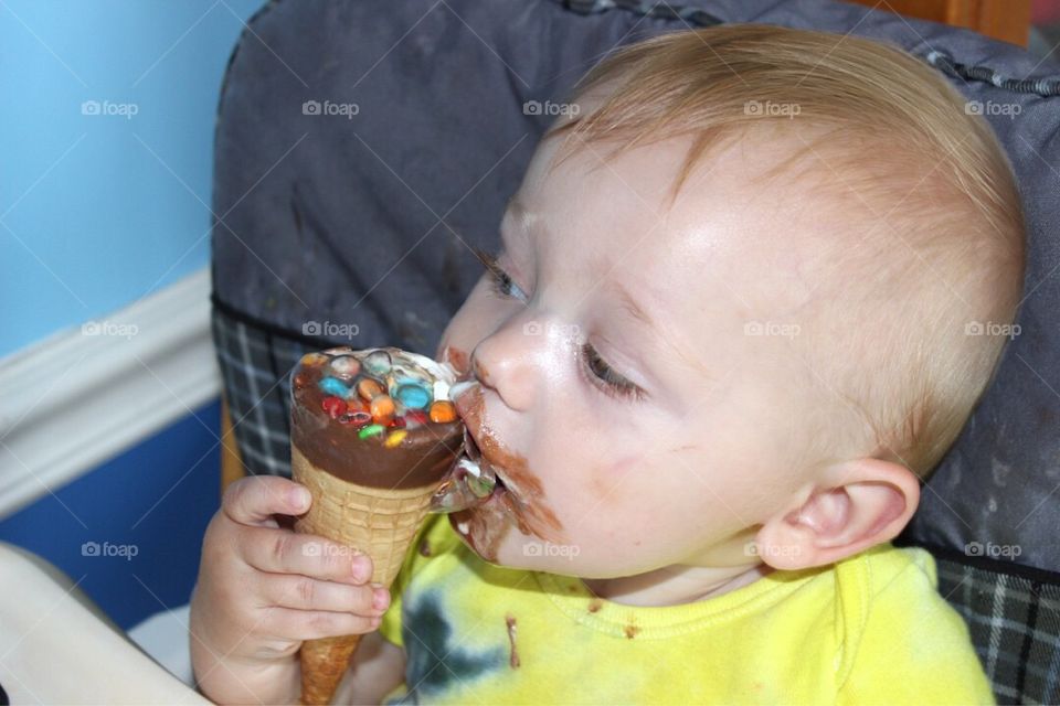 Cute baby eating ice cream