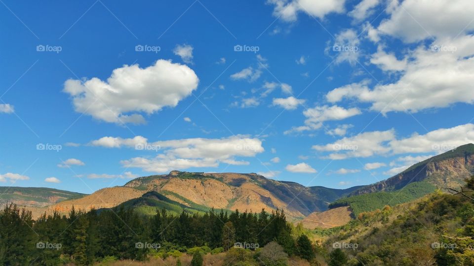 Landscape of mountains and some cloud cover